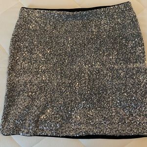 Silver sequin mini skirt.